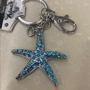 Silvertone and Blue bling Starfish bag charm Keychain
NWT
